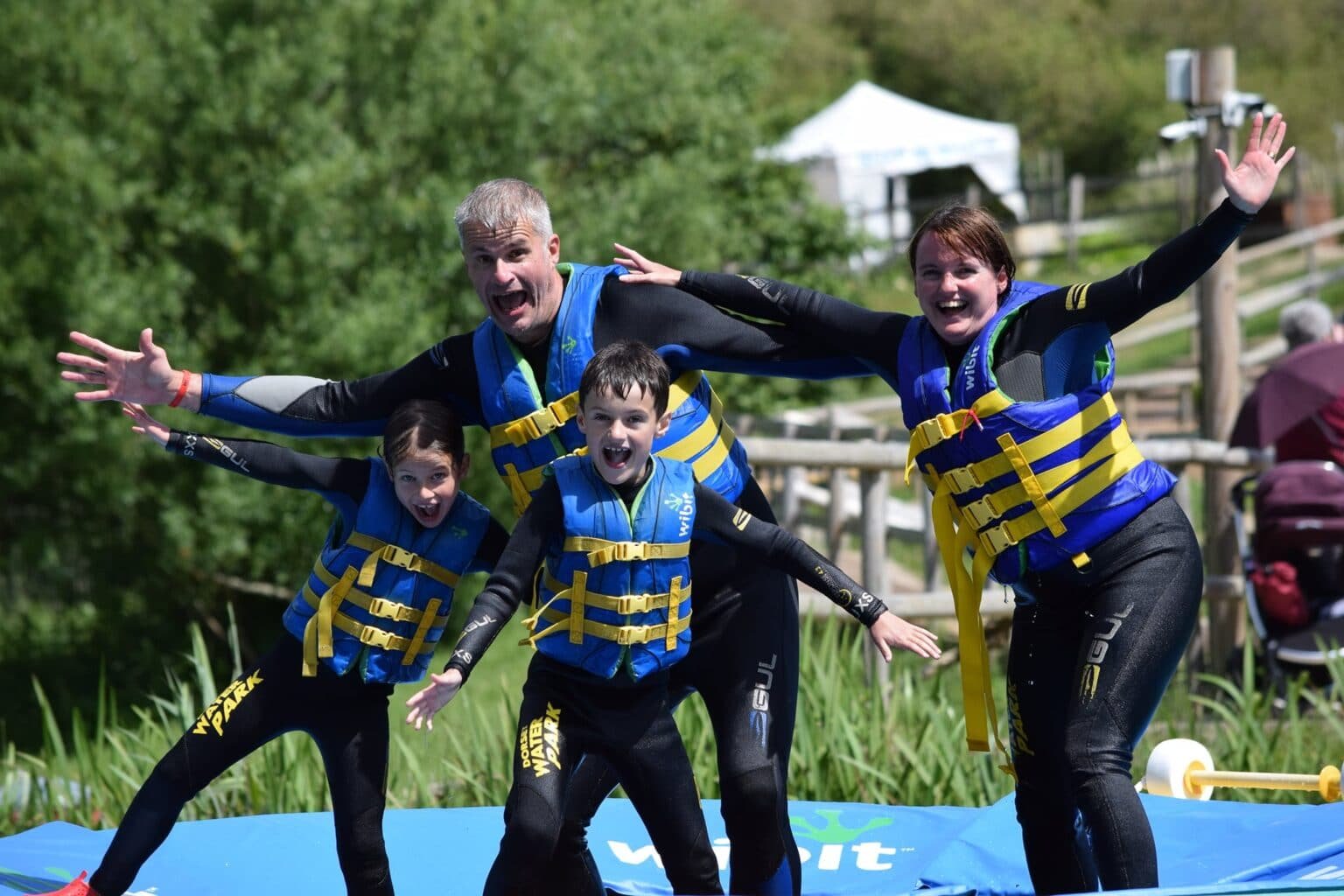 Family on water obstacle