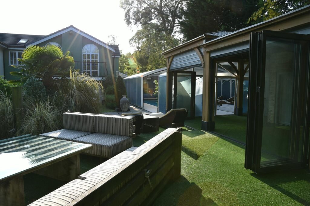 Spa in modern renovated garden with outbuildings