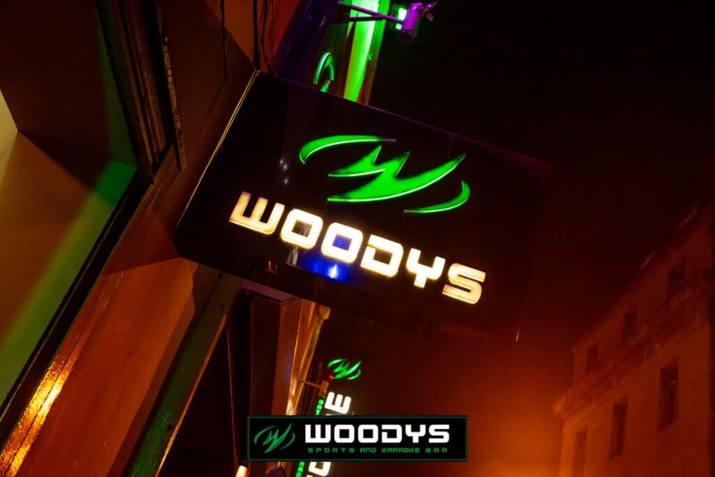 Outdoor night view of Woodys building