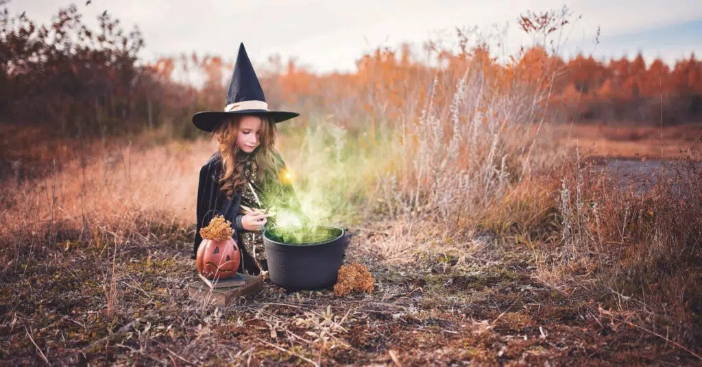 A kid playing around with magical stuff 